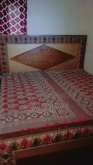 Photo - Comfortable Bed with Matching Mattress