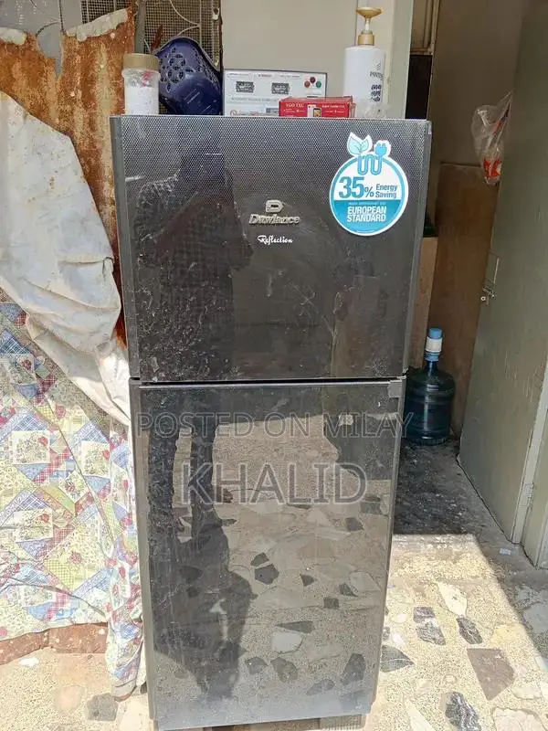 Dawlance 9170 Glass Door Refrigerator - Stylish Home Cooling Solution