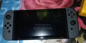 Photo - Nintendo Switch Gaming Console with 81 Pre-Installed Games