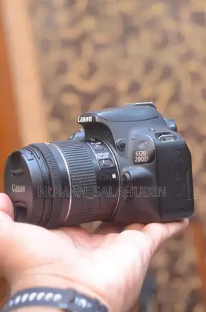 Photo - Canon EOS 200D DSLR Camera with 18-55mm Kit Lens