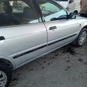 Photo - 2005 Suzuki Baleno Sedan - Excellent Condition City Car