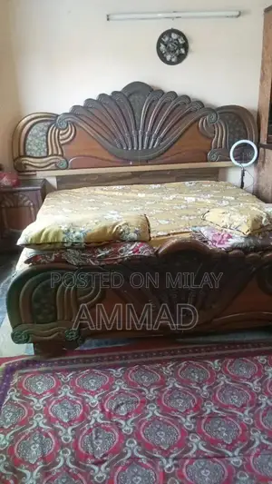 Photo - Bed with side tables and Dressing