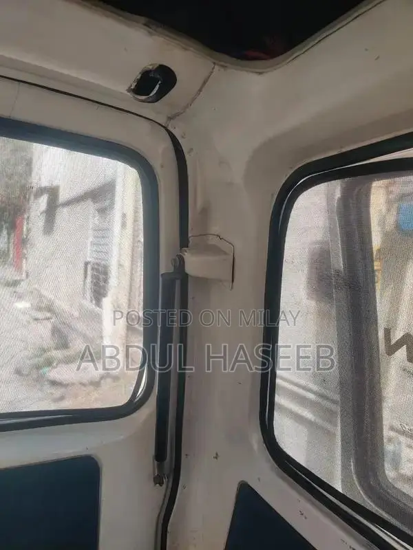 Suzuki Bolan 2013 White Compact Hatchback