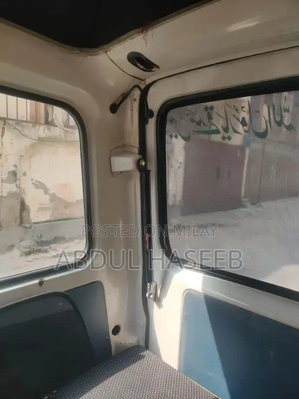 Suzuki Bolan 2013 White Compact Hatchback