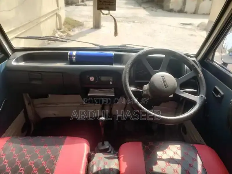 Suzuki Bolan 2013 White Compact Hatchback