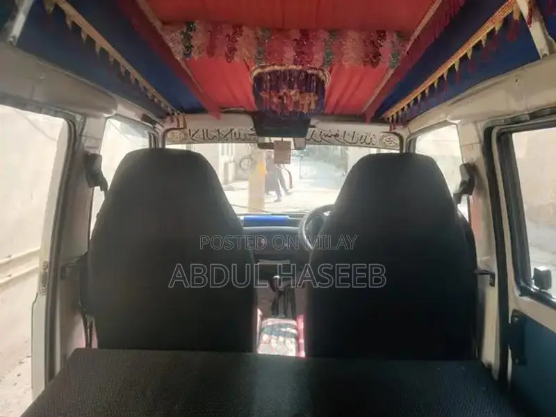 Suzuki Bolan 2013 White Compact Hatchback