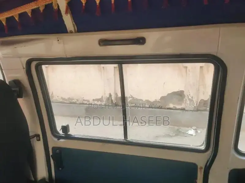 Suzuki Bolan 2013 White Compact Hatchback