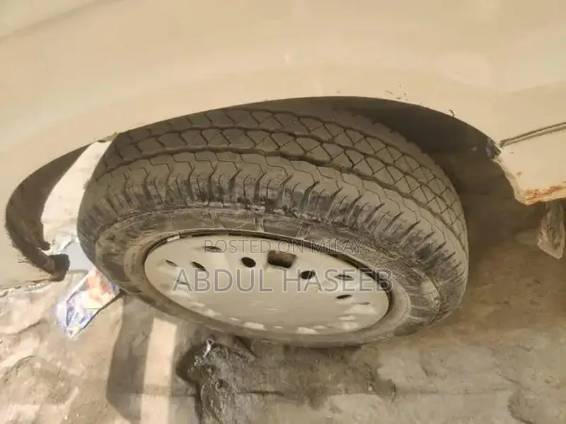 Suzuki Bolan 2013 White Compact Hatchback