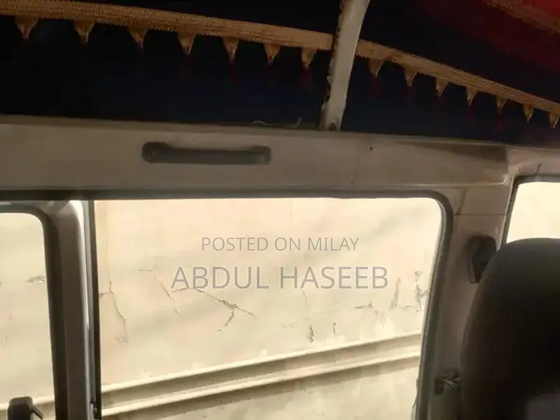 Suzuki Bolan 2013 White Compact Hatchback