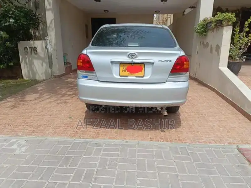 Toyota Platz - Reliable Compact Sedan with Military Service History