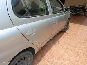 Toyota Platz - Reliable Compact Sedan with Military Service History