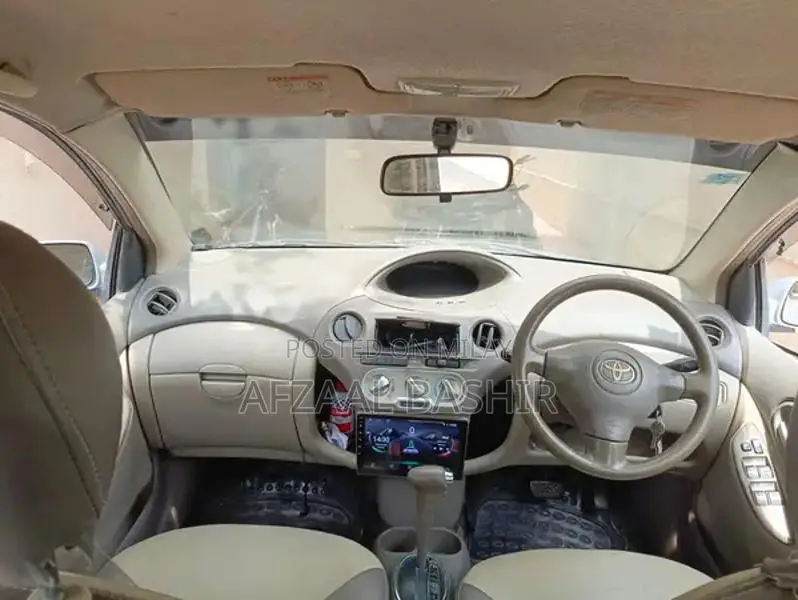 Toyota Platz - Reliable Compact Sedan with Military Service History