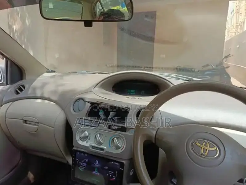 Toyota Platz - Reliable Compact Sedan with Military Service History