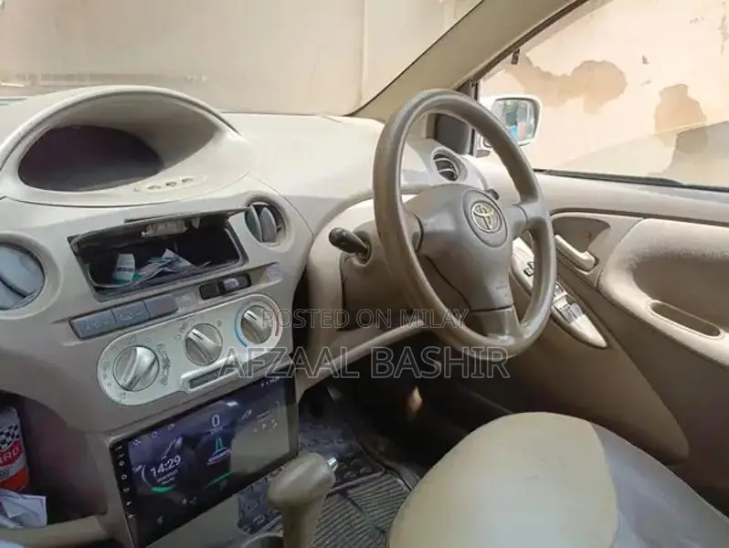 Toyota Platz - Reliable Compact Sedan with Military Service History