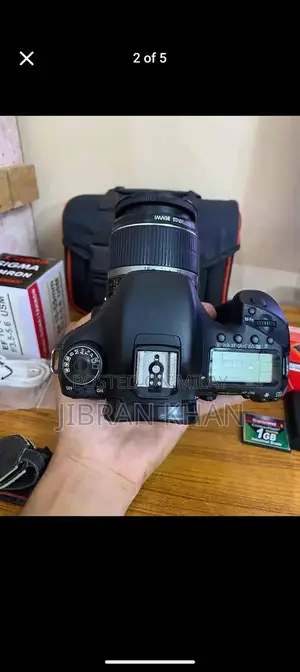 Photo - Canon 7D DSLR Camera with 1GB CF Card and Accessories