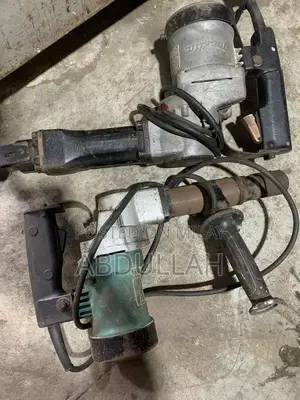 Makita Professional Hammer Drill - Heavy-Duty Power Tool for Construct