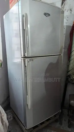 Photo - Top Mount Refrigerator - Compact Home Cooling Appliance