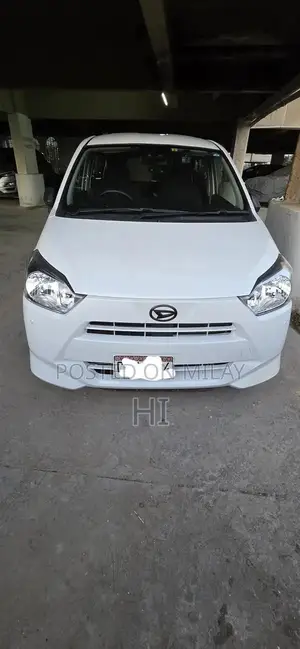 Photo - MiRA LSA3 Pearl White Compact Sedan