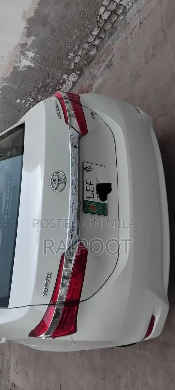 Toyota Corolla Gli 16 White Sedan with Manual Transmission