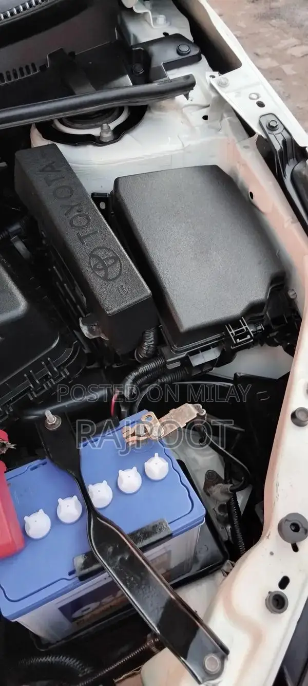 Toyota Corolla Gli 16 White Sedan with Manual Transmission