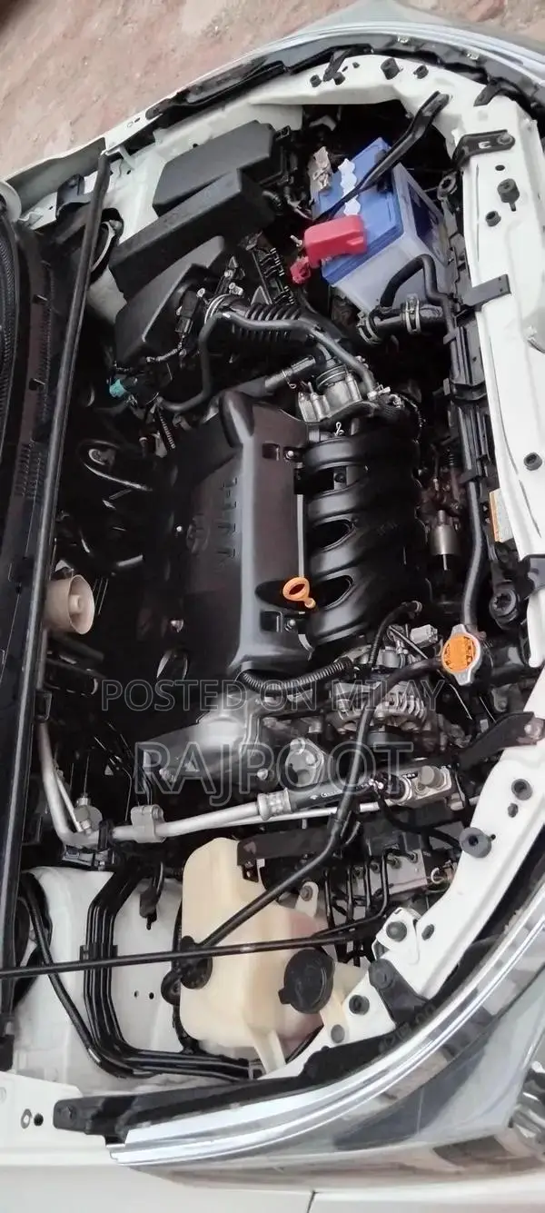 Toyota Corolla Gli 16 White Sedan with Manual Transmission