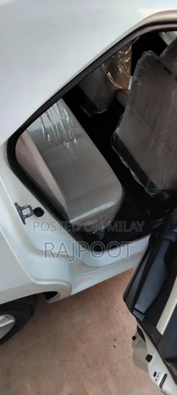 Toyota Corolla Gli 16 White Sedan with Manual Transmission