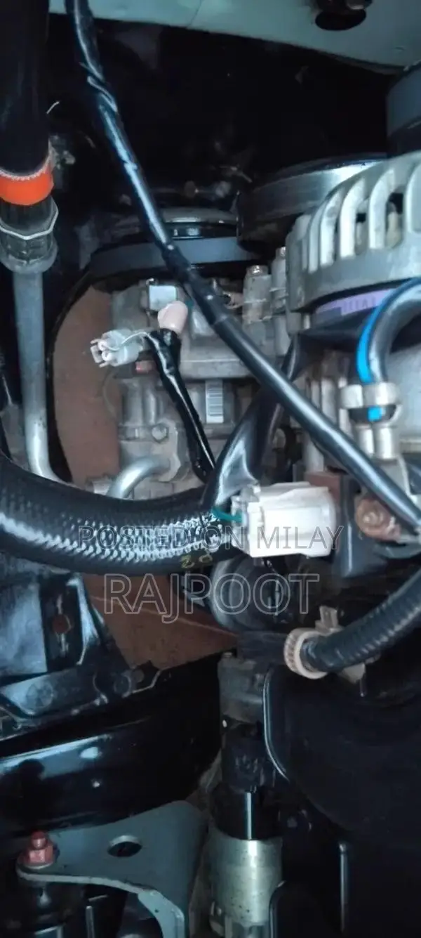 Toyota Corolla Gli 16 White Sedan with Manual Transmission