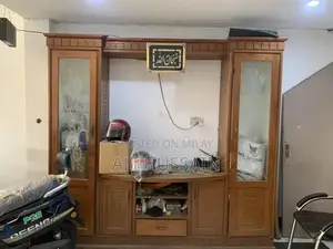 Photo - Sturdy Wooden Cabinet in Good Condition - Quality Storage Solution