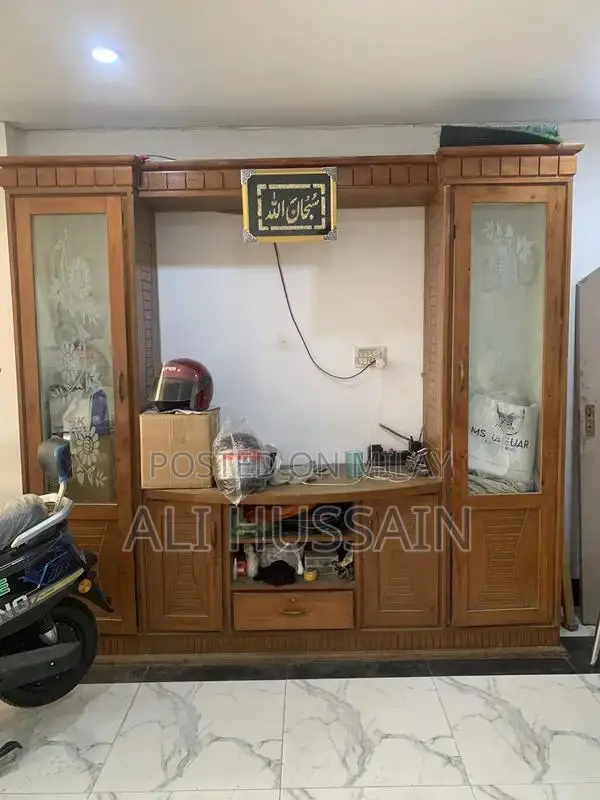 Sturdy Wooden Cabinet in Good Condition - Quality Storage Solution