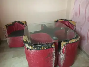 Photo - Solid Wood Dining Table with Four Matching Chairs