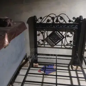 Photo - Single Bed Frame - Compact and Functional Sleeping Solution