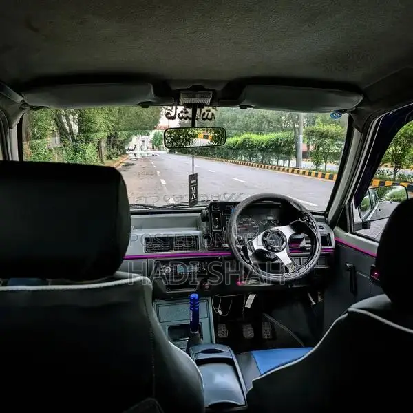 Modified 2015 Mehran Euro 2 White Sedan with Custom Upgrades