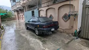 Photo - Toyota XE GL Sedan with Fuel and CNG Dual Power