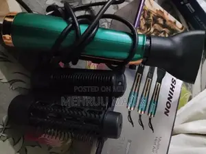 Photo - 3-in-1 Hot Air Hair Styling Comb for Multiple Hair Types