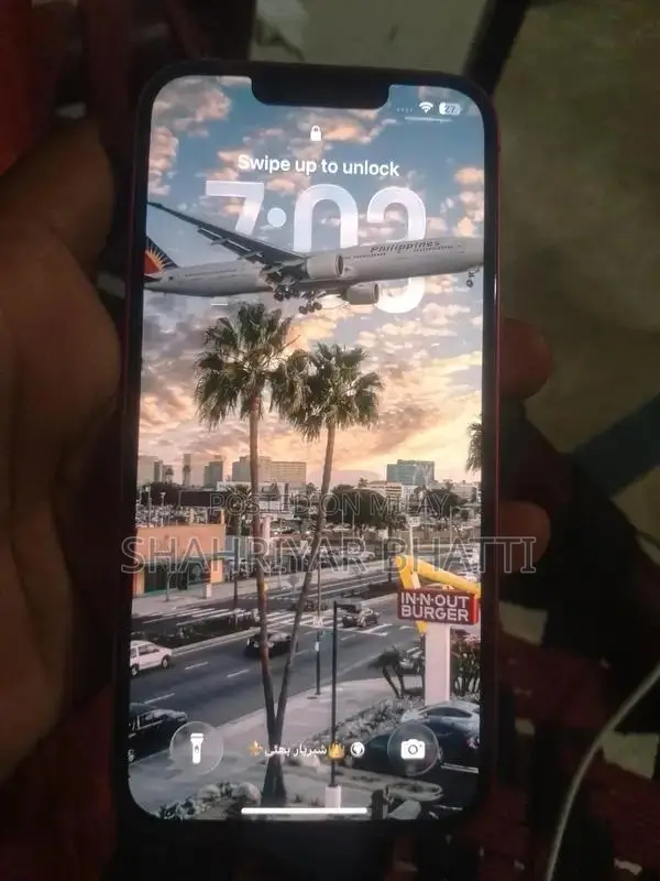 Red Color Smartphone with Perfect Battery Health