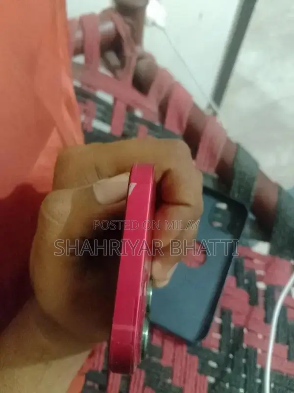 Red Color Smartphone with Perfect Battery Health