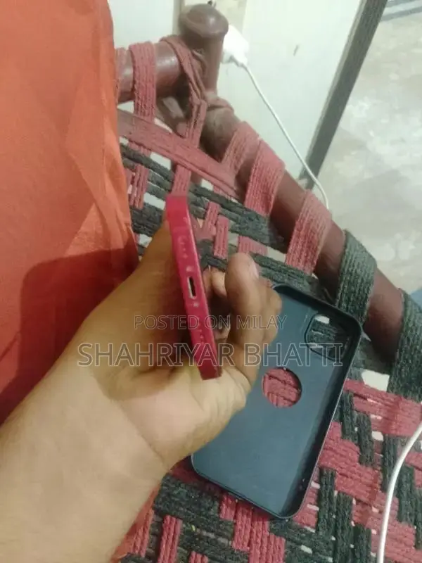Red Color Smartphone with Perfect Battery Health