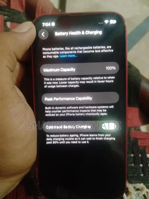 Red Color Smartphone with Perfect Battery Health