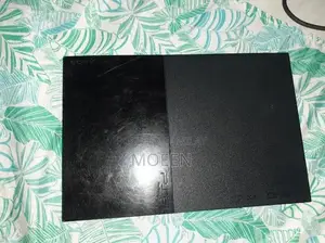 PlayStation 2 Slim Console with Games and Accessories