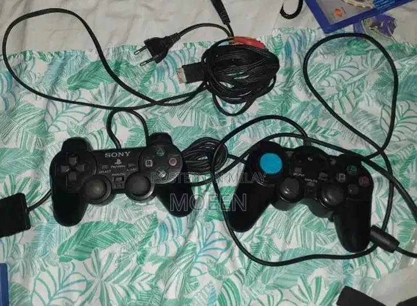 PlayStation 2 Slim Console with Games and Accessories