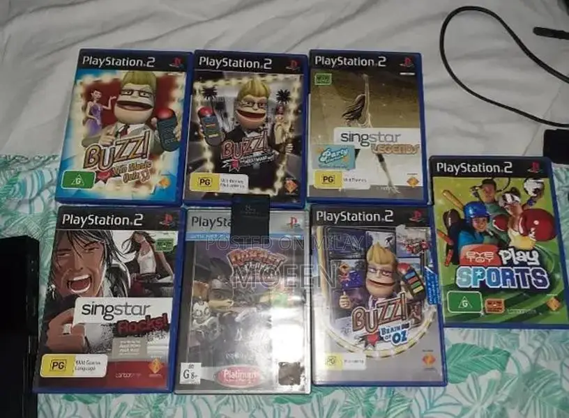 PlayStation 2 Slim Console with Games and Accessories