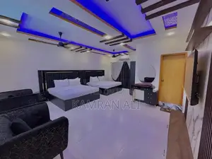 Photo - Comfortable Furnished Guest Room with Amenities