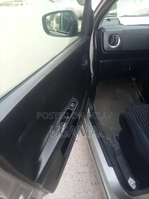 Alto Compact 2-Door Shower Vehicle Clean and Ready