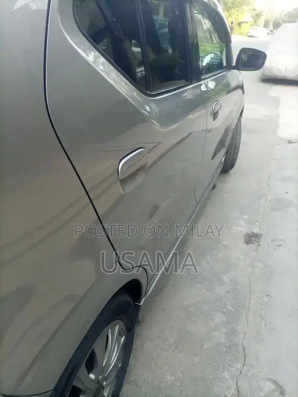 Alto Compact 2-Door Shower Vehicle Clean and Ready