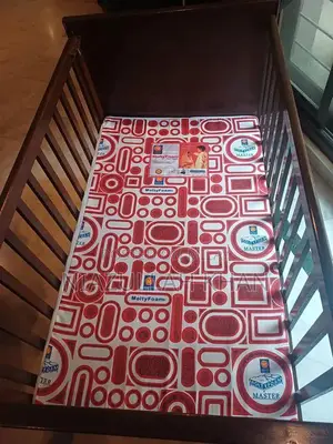 Photo - Teak Wood Baby Cot - Sturdy Traditional Infant Sleeping Solution