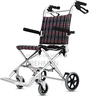 Compact Foldable Wheelchair - Like New Condition