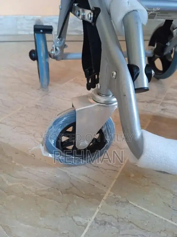 Compact Foldable Wheelchair - Like New Condition