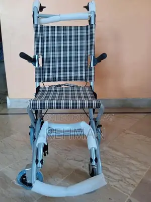 Compact Foldable Wheelchair - Like New Condition