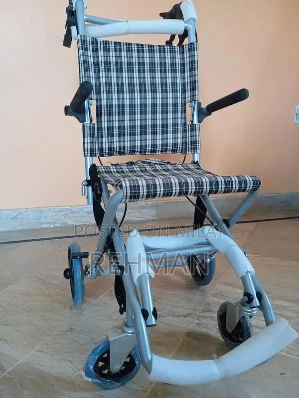 Compact Foldable Wheelchair - Like New Condition