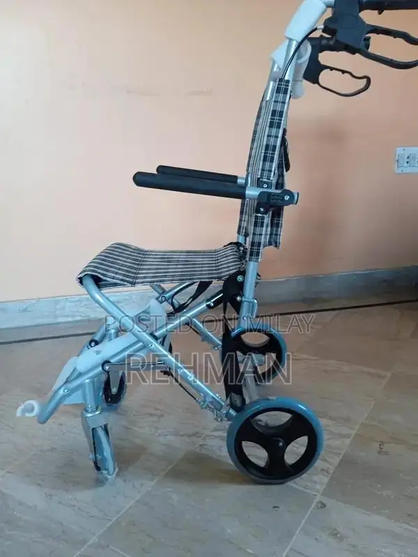 Compact Foldable Wheelchair - Like New Condition
